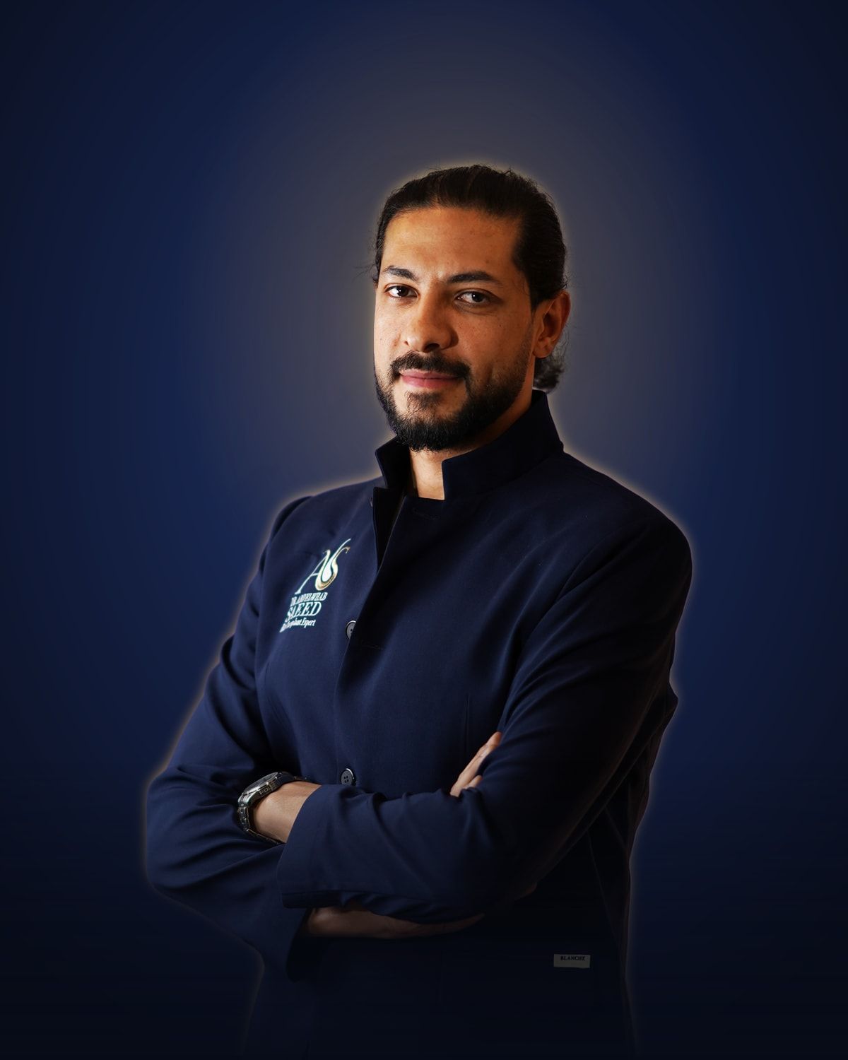 د. عبدالوهاب سعيد بجاكيت العيادة الكحلي